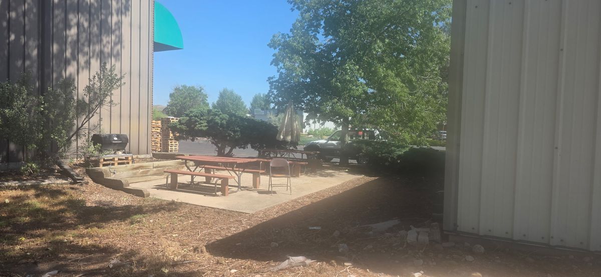 Outdoor patio and picnic area at The Fort Recovery clubhouse